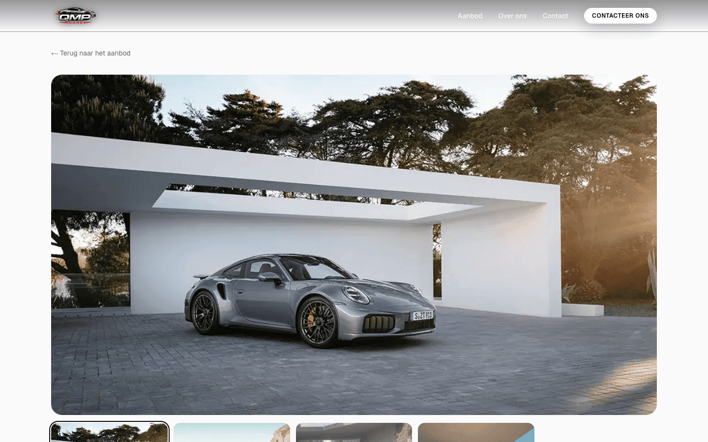 QMP Cars — een autodetailpagina met een full-bleed cinematische hero-afbeelding